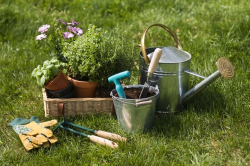 Larger rear garden near Hainault Forest undergoing mowing and green waste collection
